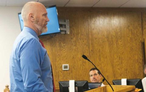 Press photo/Thomas Sherrill - Macon County Schools Superintendent Chris Baldwin speaks to the Macon County Commissioners during the May 30 budget workshop.