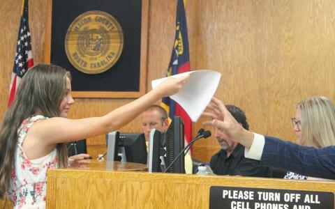 Press photo/Thomas Sherrill - Gracie Parker submits a copy of her letter asking that a portion of the county’s opioid settlement funds be used for youth-specific programs.