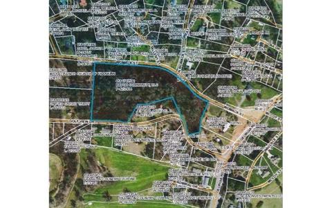 A map showing the property (outlined in blue) that KAVOD Communities has requested rezoned from residential to Neighborhood Mixed Use. David Forkner, a representative for the group, said they plan to use it for a school/gym/after-school program and karate school.
