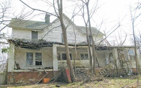 Photo/Town of Franklin - The Franklin Town Council will hold a public hearing on an ordinance to condemn this house on East Main Street. The owner has received violation notices and was given 90 days to demolish the house or bring the property up to code. That time has expired and the public hearing will be held on Oct. 2.