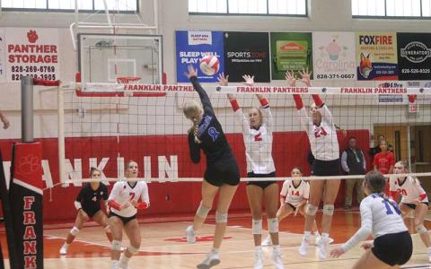 Press photo/Will Woolever - Outside/opposite Hitters Aubrey Haley (left) and Talley Kinsland attempt a block versus Smoky Mountain Sept. 7.