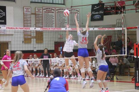 Press photo/Will Woolever - Junior outside hitter/defensive specialist Kyrah Bowles lifts a ball over the net vs. West Henderson Oct. 6. 