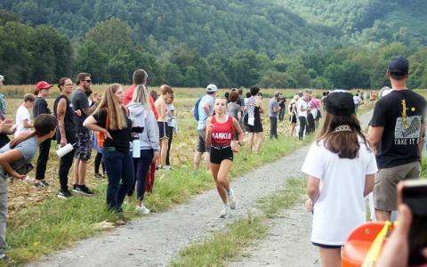 Promising freshman Morgan Cress nears the finish line in a meet at the Cherokee Mother Town near Ela last month. As the first female Panther finisher, Cress placed fifth out of 71 runners at the Mountain Seven Conference Championship meet in Hendersonville  Oct. 17, earning All-Conference honors in the process. (Press file photo)