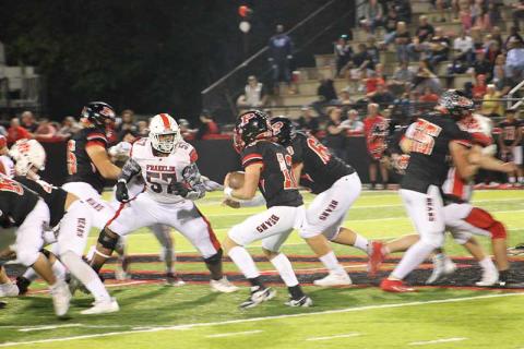 Press photo/Will Woolever - Senior Jacob Gibson corrals a Pisgah ballcarrier in Canton Sept. 29. 