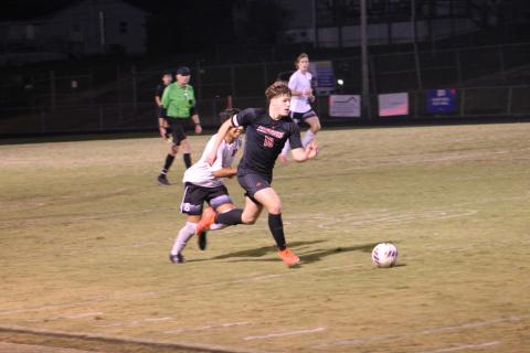 Press photo/Will Woolever - Senior Jaydon Pevia makes a run upfield against Pisgah Oct. 11.