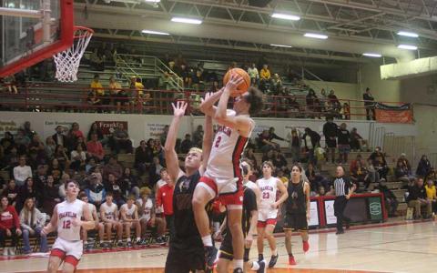Press photo/Will Woolever - Junior guard Braylen Dezarn attempts a short jump shot in Franklin’s home opener versus Cherokee Nov. 30