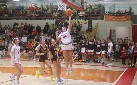 Press photo/Will Woolever - Senior forward/center Avery Moffitt elevates for a layup in Franklin’s home opener versus Cherokee Nov. 30. 