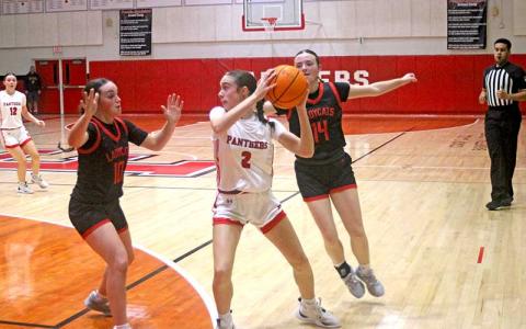 Press photo/Will Woolever - Freshman point guard Audrey Pressley faces a double-team versus Rabun County, Georgia Dec. 5.