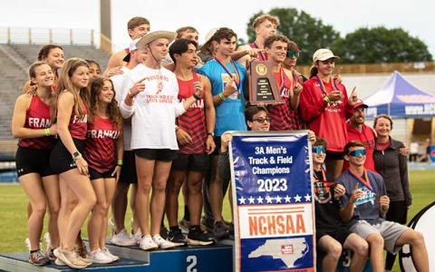 Panther track and field are pictured with their championship banner at the 3A state title meet in Greensboro May 19. 