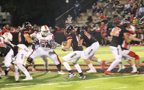 Press file photo - Two-way All-Mountain Seven lineman Jacob Gibson corrals a Pisgah ball carrier in Canton Sept. 29. The senior was one of three All-Conference First Team selections for the Panthers this year.