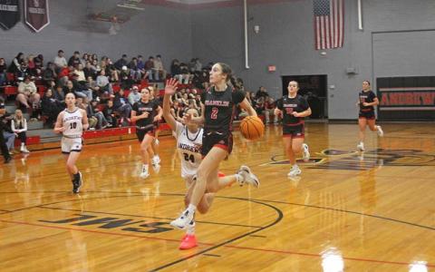Press photo/Will Woolever - Freshman guard Audrey Pressley goes airborne while driving to the basket versus Andrews Jan. 3. 