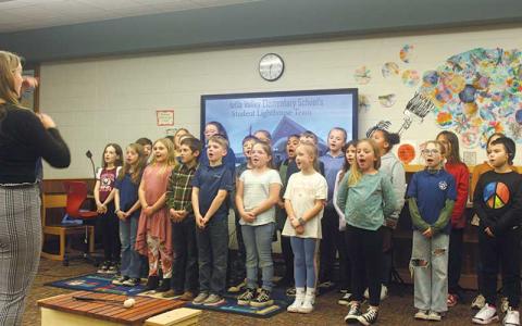 Press photo/Thomas Sherrill - Iotla Valley students perform during the January school board meeting.