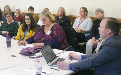 Press photo/Thomas Sherrill. Angel Medical Center CEO Clint Kendall (far right) speaks to the Behavioral Health Task Force during its March 21 meeting.