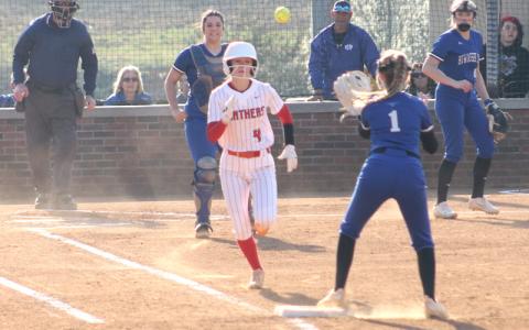 Press photo/Will Woolever. Freshman third baseman Layla Maloy tries to beat an out versus Hiwassee Dam March 21 at Macon Middle School. 