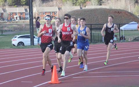 Press photo/Will Woolever - Seniors Logan Russo (left) and Barrett Stork lead the pack in the 1,600-meter run at Western Carolina University March 7. 