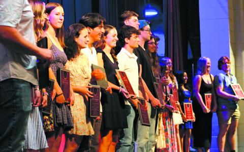 Press photo/Will Woolever. The Class of 2024 shows off their Senior Plaques at the FHS Athletic Awards Ceremony May 23. 