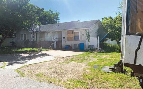 Press photo/Will Woolever - The Town of Franklin is foreclosing on this Hillside Street house as it does not meet the minimum housing requirements. It has not had water and sewer service in nearly three years and taxes are owed.