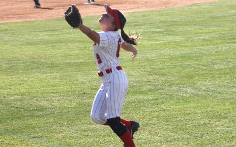 Press file photo.  Then-junior Laura Holland makes an excellent over-the-shoulder catch at Macon Middle School last year. 