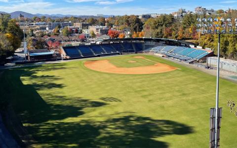 Alyssa Quirk/Asheville Tourists.  The Asheville Tourists stadium with a view of the Blue Ridge Mountains and the surrounding city.