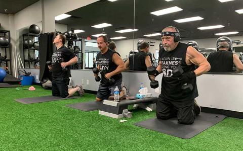 Press photo/Will Woolever - (From left) Stephen Drake, Johnny Lee and Dr. Rocky Battaglino pump iron at Franklin Health and Fitness recently. The trio meets twice a week to bust out nearly 2,000 pushups and flys. 
