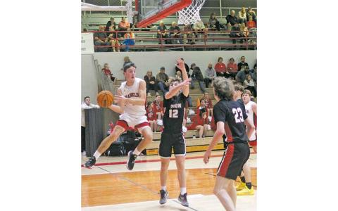 Press file photo - Then-junior Max McClure looks for an outlet pass versus Rabun County last December. McClure enters his senior season as one of just three men in Panther history with 1,000 career points. 