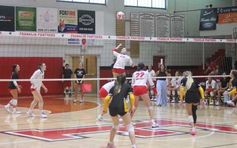 Press photo/Will Woolever - Senior outside hitter Kyrah Bowles prepares for a spike in Franklin’s home opener versus Murphy Aug. 15. 