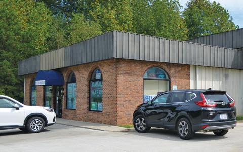 Press photo/Mia Overton - The Town of Franklin has entered a contract with the option to buy this building on Carolina Drive to house the ABC store, which would move from its current location in Macon Plaza. 