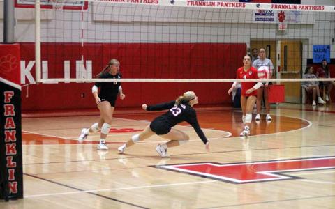 Press photo/Will Woolever - Sophomore Danni Ledford receives a difficult pass versus North Henderson Sept. 3. 