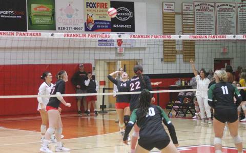 Press photo/Will Woolever - Senior Cali Queen prepares to strike the ball versus East Henderson on Tom Raby Court Sept. 17. Queen returned for one final match before undergoing major surgery after injuring her knee versus Murphy Aug. 15. 