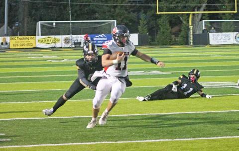 Press photo/Will Woolever - Senior Braydon Hervey leaves defenders in his wake at Tuscola Oct. 15.