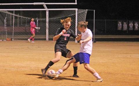 Press photo/Will Woolever - Senior defender Alex Trivett fights for possession versus Smoky Mountain at the Panther Pit Oct. 23. 