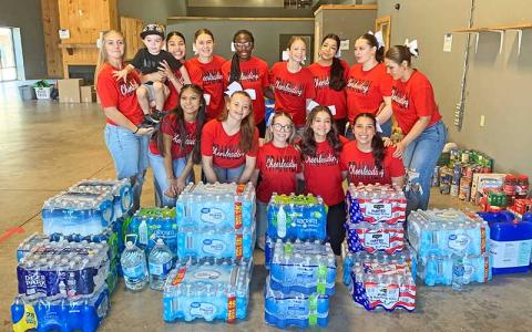 On Oct. 5 Panther cheer and dance gathered food and supplies at Discover Church for delivery to hard-hit Henderson County Oct. 7 (Press photo/Will Woolever).