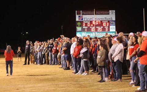 Press photo/Will Woolever - Former Panther athletes and their families are pictured in a halftime ceremony at the Panther Pit’s final regular-season game Nov. 1.