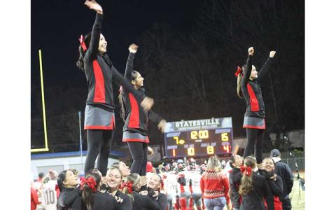 Press photo/Will Woolever - Panther cheer and dance is pictured at a football playoff game at Statesville Nov. 15.