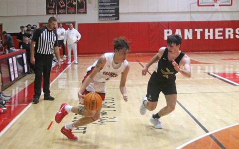 Press photo/Will Woolever - Junior Jack Teesateskie drives toward the basket in Franklin’s last preseason scrimmage versus Hayesville Nov. 21. Teesateskie transferred to Franklin this summer from Cherokee, where he averaged more than 17 points per game for the Braves. 