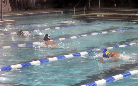 Press photo/Will Woolever - Isaiah Baldwin (left) and Jonah Brant swim the 100-yard breaststroke at Highlands Dec. 20.