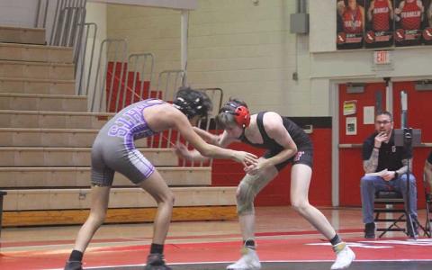 Press file photo - Then-freshman Branch Browning hand-fights with a wrestler from North Henderson on Tom Raby Court last year. 