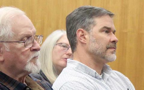 Press photo/Thomas Sherrill - New Macon County Planning, Permitting and Development Director Joe Allen (right) at the Jan. 14 Board of Commissioners meeting.