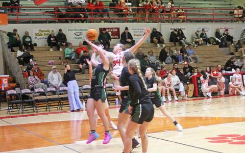 Press photo/Will Woolever - Freshman Addie Powell fights for a rebound versus East Henderson Jan. 21. 