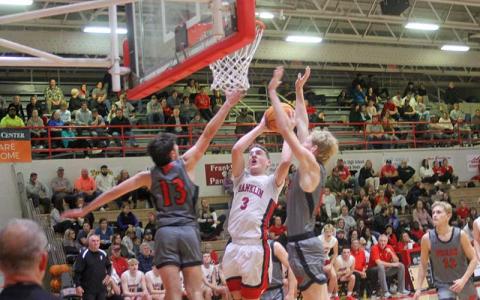 Press photo/Will Woolever - Senior Max McClure attempts a contested layup vs. Pisgah Jan. 3.