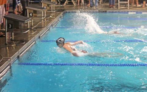 Senior Zoi Walker swims the 100-yard butterfly at Highlands Dec. 20 (Press file photo)