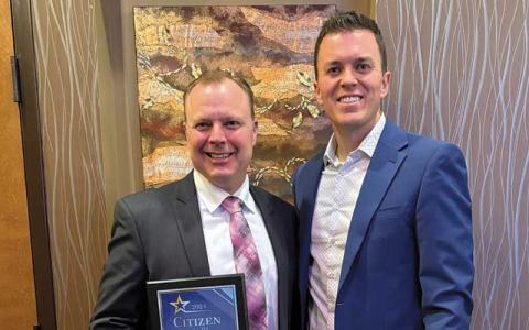 Photo/Eric Haggart - Clint Kendall (left) receives the Citizen of the Year Award from Matt Corbin, past president of the Chamber of Commerce board of directors.