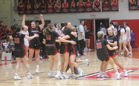 Press photo/Will Woolever - Panther varsity women’s hoops celebrate on Tom Raby Court after upsetting Pisgah in the Mountain Seven Conference Final Feb. 20.