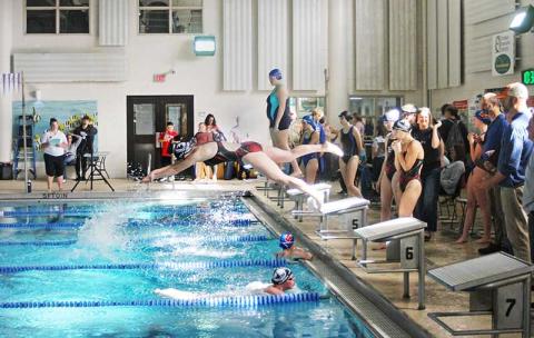 Press file photo - Sophomore Kenna Keyworth dives off the block in the girls 400-yard freestyle relay during the Mountain Seven Conference Championships at the Waynesville Aquatic Center Jan. 18.