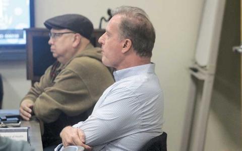 New Board of Health member Steve Grissim (right) and Dr. Carlos Vargas at the Feb. 25 Board of Health meeting.