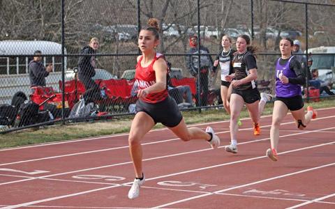 Press file photo - Macon Early College senior Laura Covarrubias takes first place for Franklin in the 100-meter dash at the Western Carolina University Kickoff Invitational March 7. After more than three years of MEC athletes competing for Franklin, the school plans to field its own athletic teams beginning next school year. 