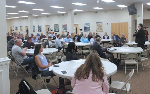 Press photo/Thomas Sherrill - Sen. Kevin Corbin speaks to a room full of internet-service providers at a town hall at Holly Springs Baptist Church.