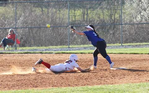 Press photo/Will Woolever - Freshman Suzanna Cabe slides underneath a throw while stealing second base vs.  Hiwassee Dam March 19. 