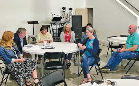 Press photo/Shelby Powell - A collection of Macon County Schools counselors and mental health specialists speak with Ronnie Beale about the need for additional mental health resources in public schools, namely funding and personnel. 
