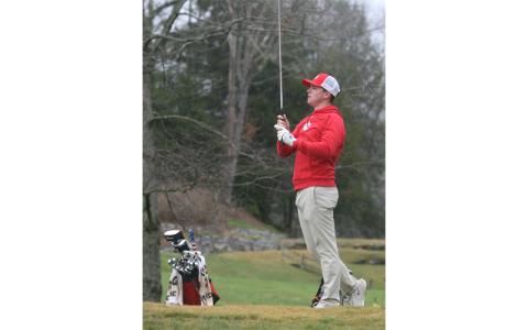 Press photo/Will Woolever. Junior Braylen Dulicai tracks his ball’s flight at Highlands Falls Country Club March 24. 